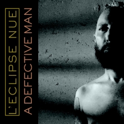 L'Eclipse Nue - A Defective Man/Torn Spectral Lens (USA), Metalbox ...